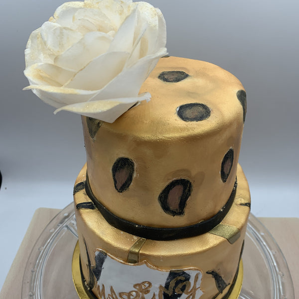 Pastel zebra y leopardo con rosa en papel de azucar