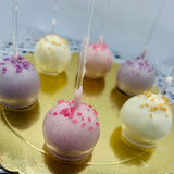 Detalle de cake pops cubiertos en chocolate artesanal
