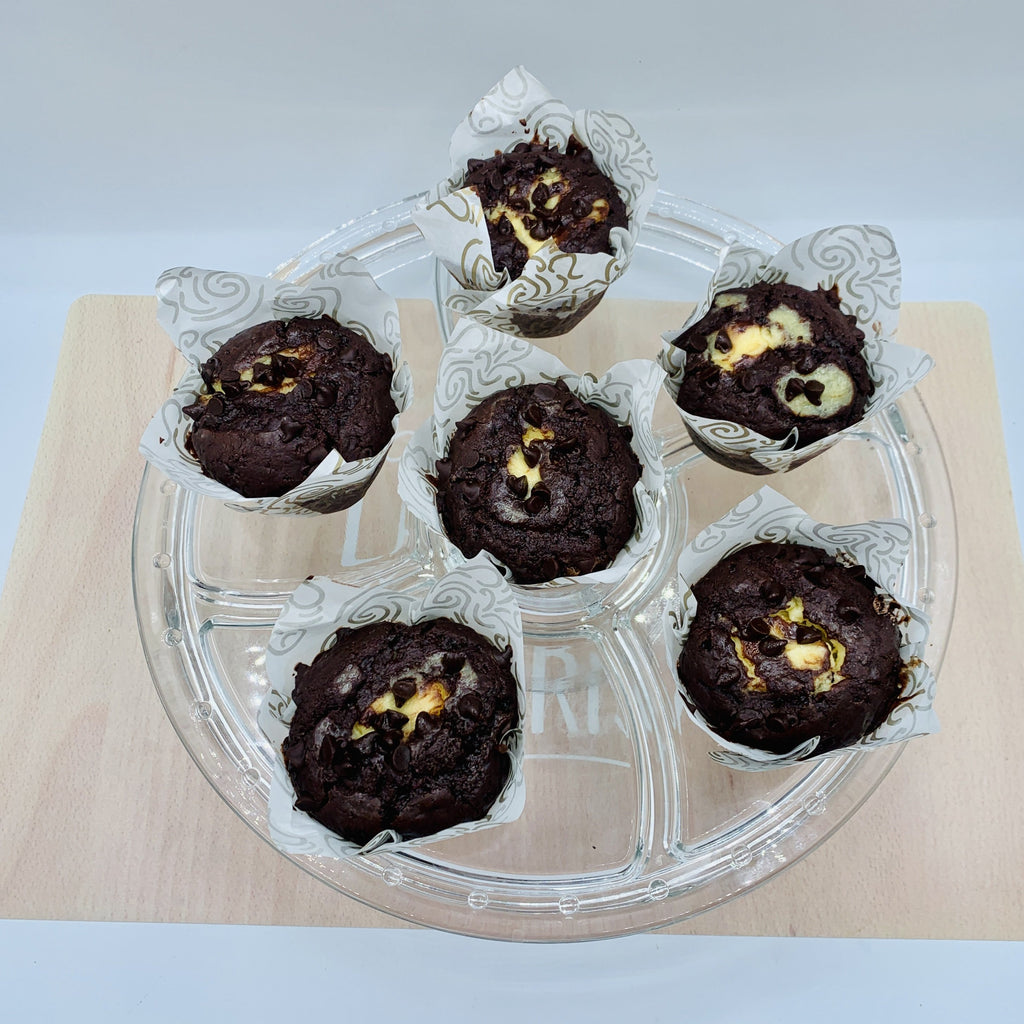 Compra Muffins de chocolate rellenos de cheesecake Nurita Cakery