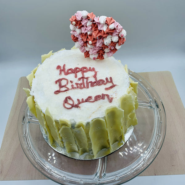 Pastel de coco rellena de dulce de leche y merengue