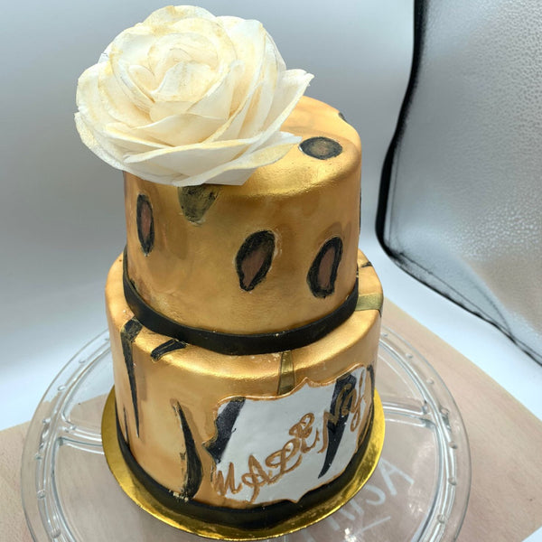 Pastel zebra y leopardo con rosa en papel de azucar