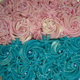 Pastel de revelación del sexo del bebé mitad rosa mitad azul artesanal en Barcelona
